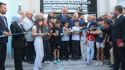 KÜTÜPHANE AÇILIŞINA KATILDI Kültür ve Turizm Bakanı Mehmet Nuri Ersoy,